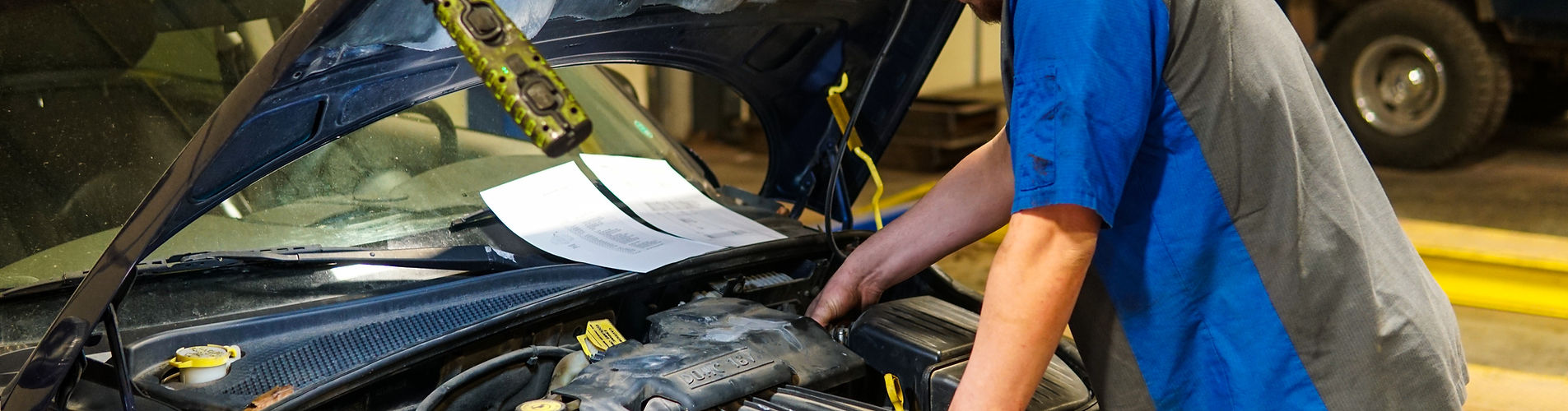 mechanic checking throttle