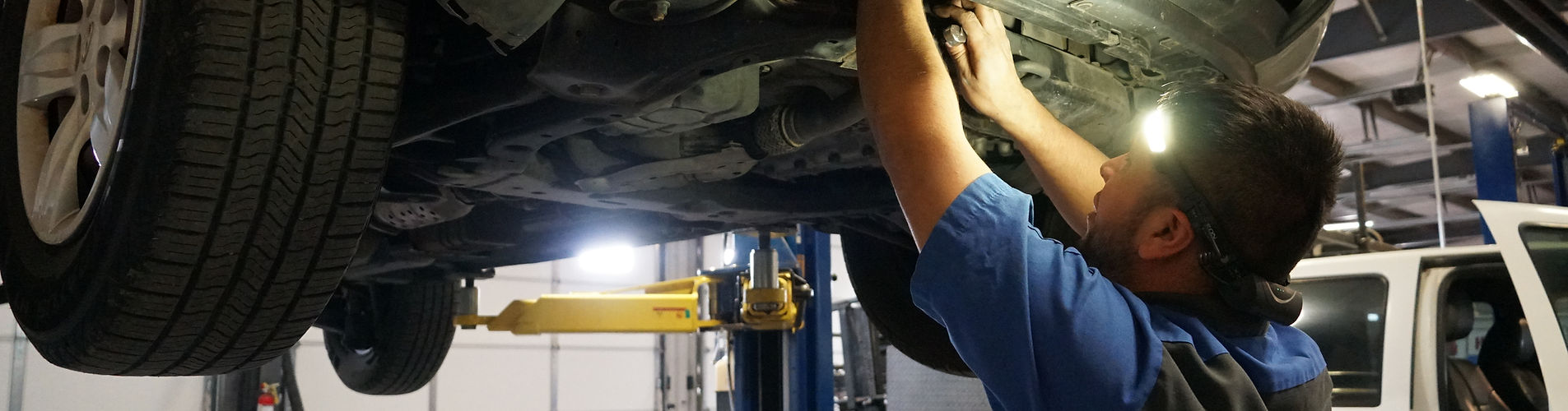 mechanic working on transmission