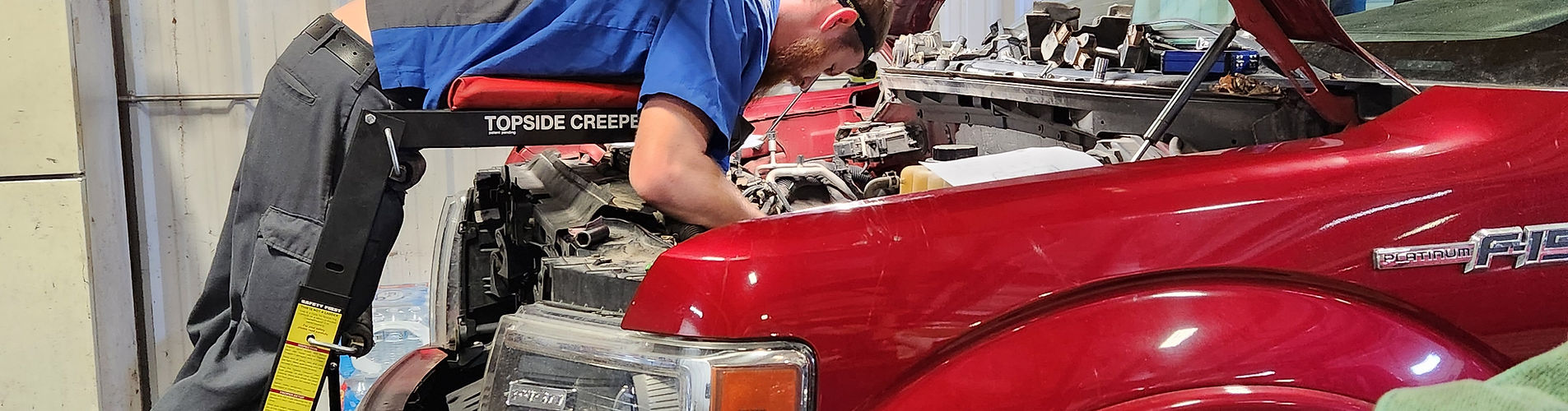 mechanic working on truck